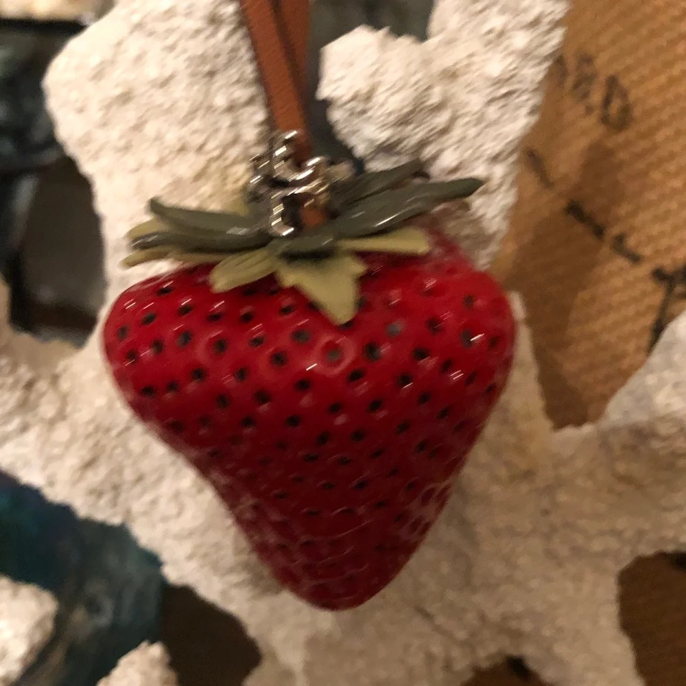 Authentic New with tag. Tory Burch Red Strawberry bag charm.